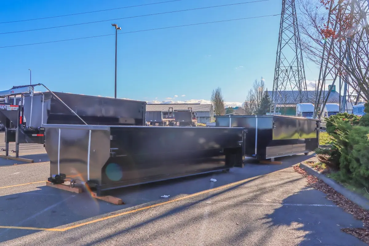 Roll-off dumpster ready for waste disposal at job site for 2 Yard Dumpster Rental in Niceville